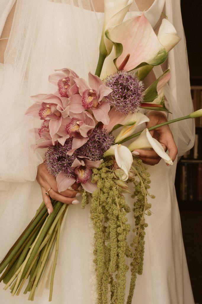 Corporate conference room with precisely timed floral displays preserving elegance through business hours